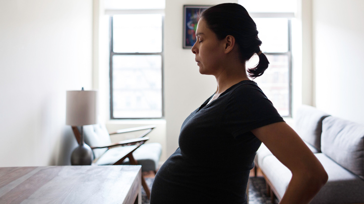 Pregnant Woman Doing Breathing Exercises