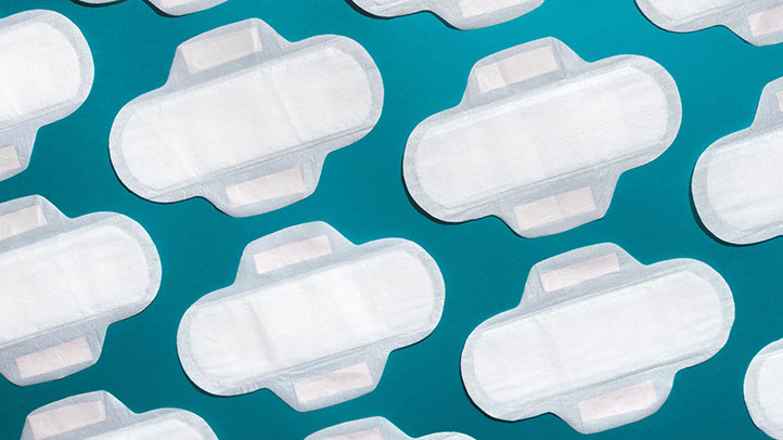 cramps but no period, pads on a blue background